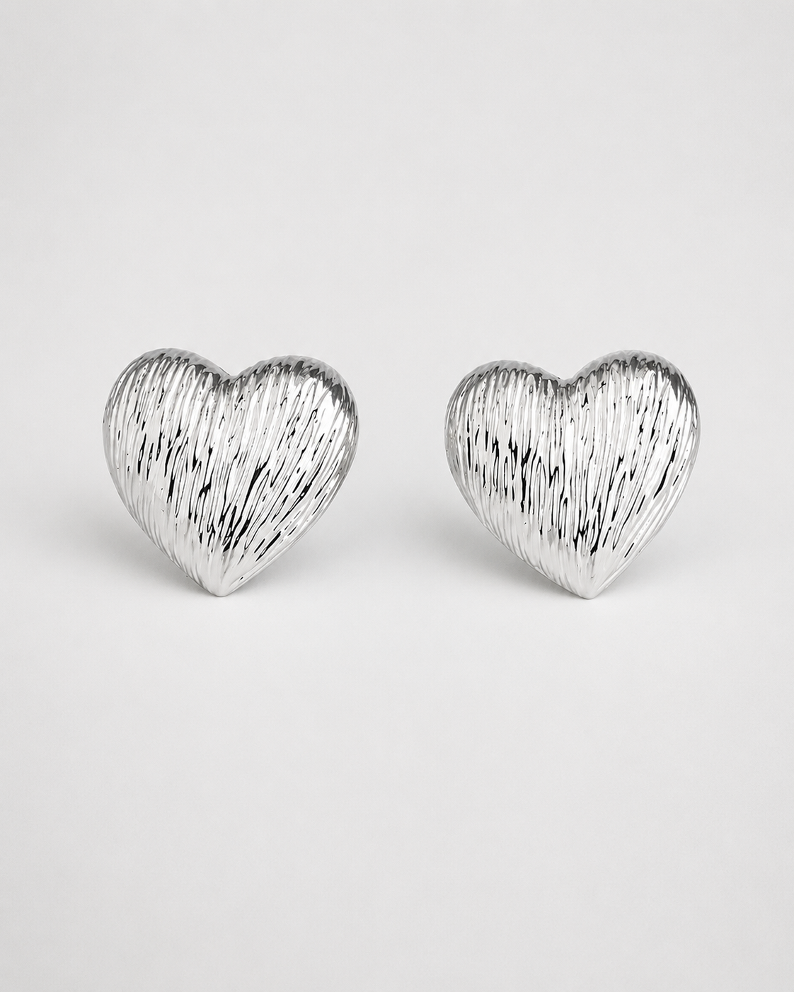 Radiant Textured Silver Heart Earrings