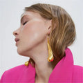 Petaline Gold Textured Wave Earrings