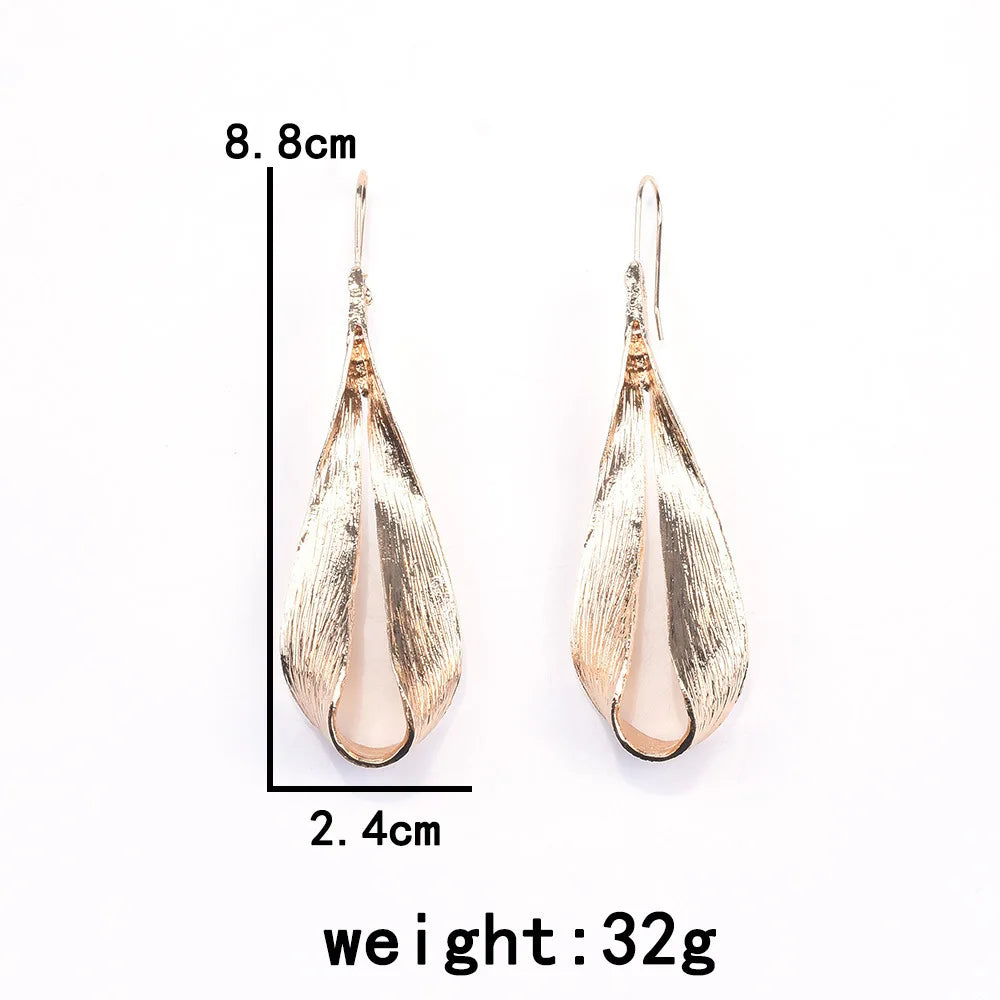 Petaline Gold Textured Wave Earrings