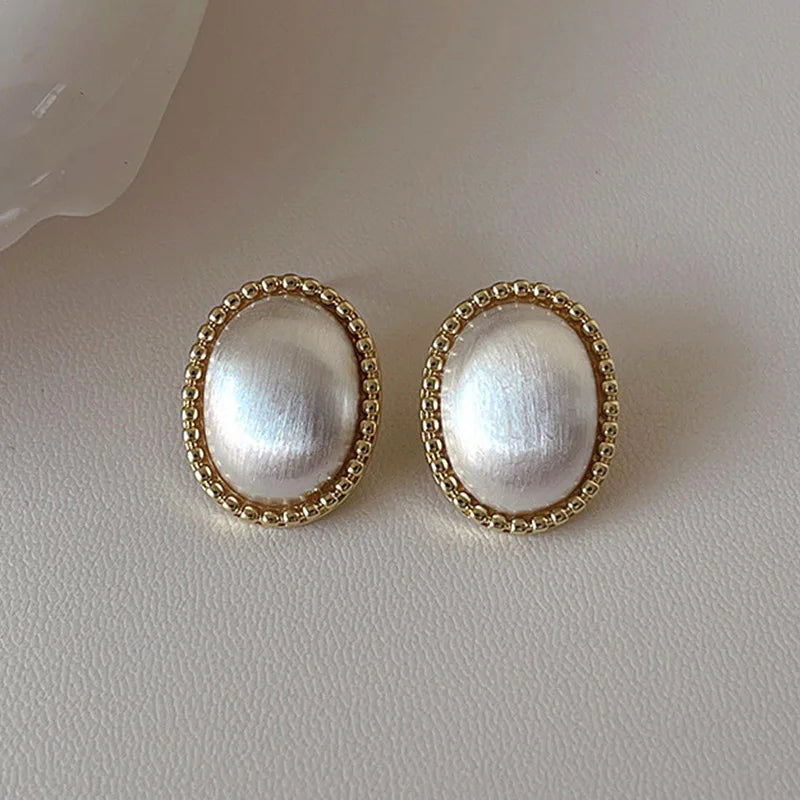 Silent Confession Gold-Trim Pearl Earrings